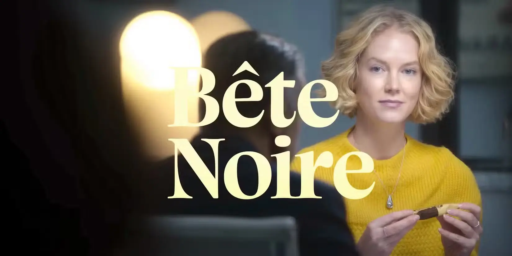 Cinematic movie frame mockup featuring a blonde woman in a yellow sweater with bold title overlay featuring Charlea typeface in use