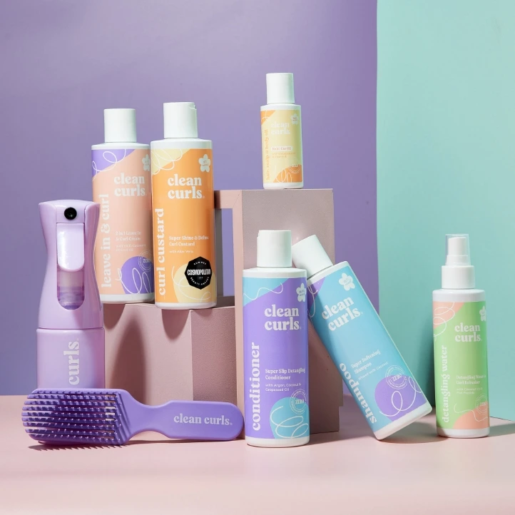 Clean Curls hair care products featuring Asikue font in use