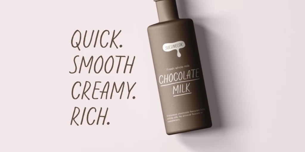A realistic mockup featuring a premium handwriting font paired with a clean sans serif for an organic chocolate milk brand packaging